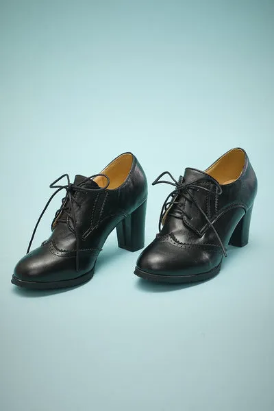 Tacchi chunky in pelle nera