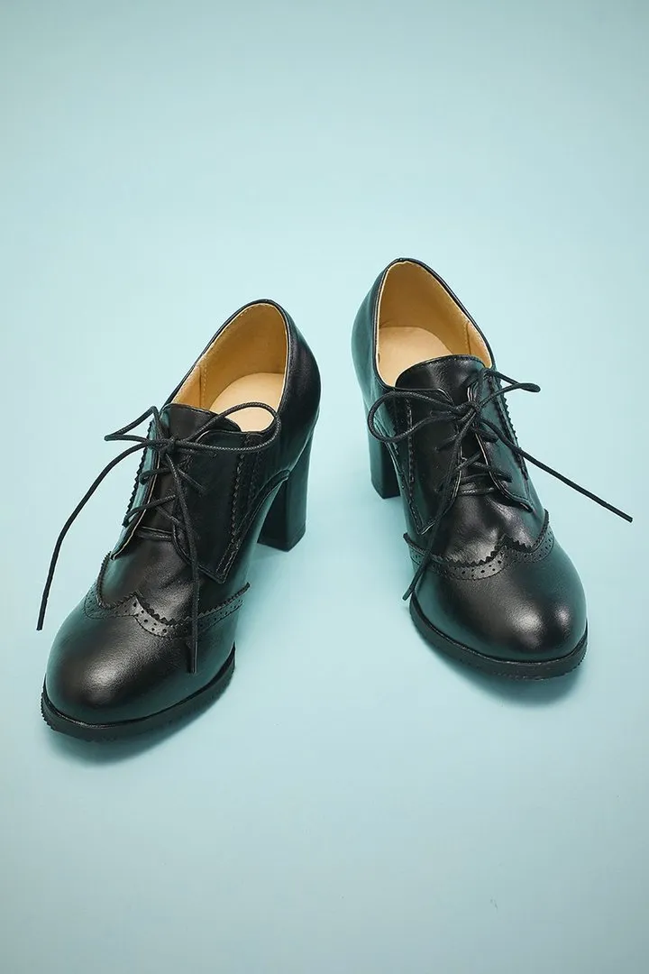 Tacchi chunky in pelle nera